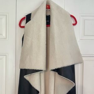 ME JANE.Faux suede black vest w/cream color faux fur.